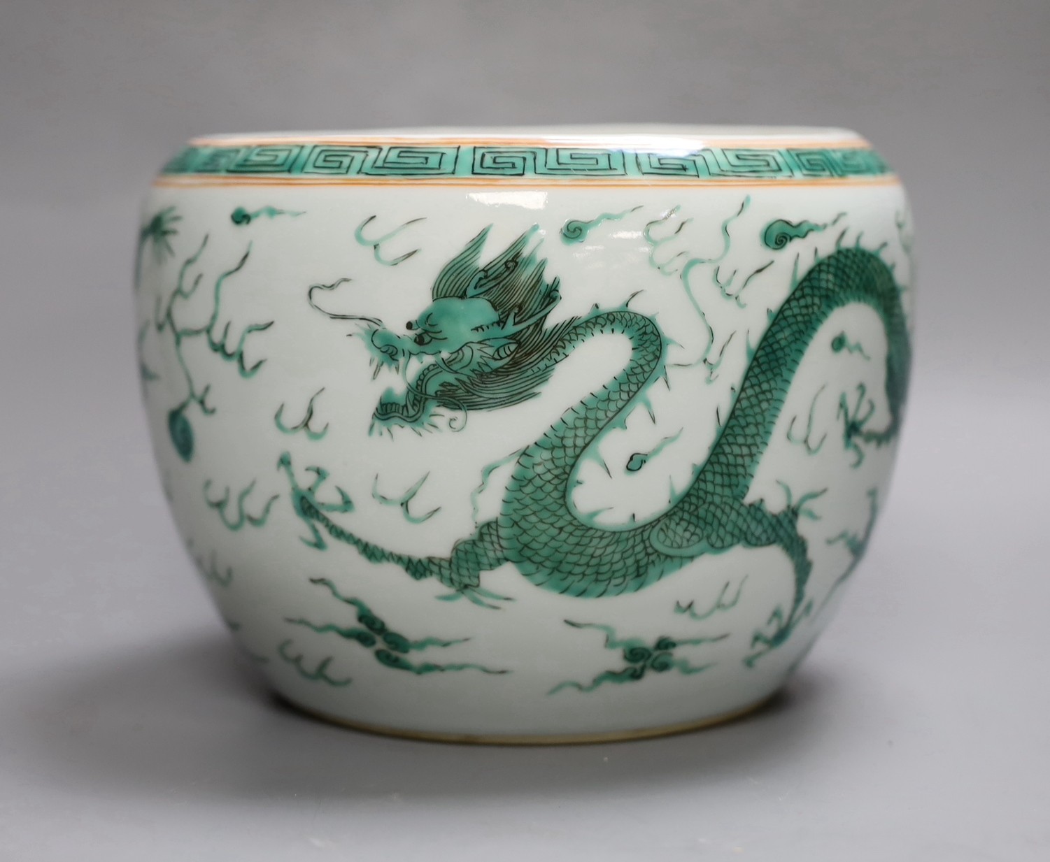 A Chinese famille verte dragon jardiniere, 14.5cm tall